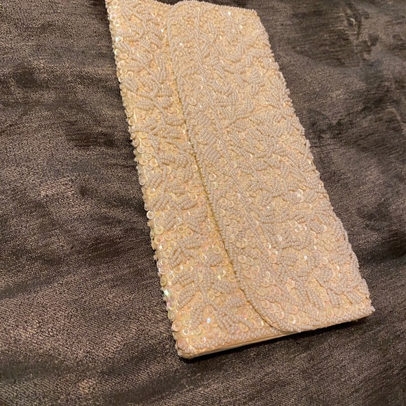 Plush Beige Clutch with Flap Closure and Textured Finish - Picture 3 of 7